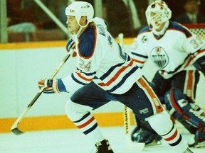 Edmonton Oilers defenceman Dave Manson in action against the Winnipeg Jets on Sept. 30, 1992, in front of goalie Norm Foster.