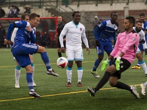 FC Edmonton Ben Fisk can't get the ball past Miami FC goalkeeper Mario Daniel Vega during North American Soccer League action at Clarke Field on Sunday, September 11, 2016 in Edmonton. Greg  Southam / Postmedia  (To go with a Derek Van Diest sports story) Photos off FC Edmonton game for story running in print Monday, Sept. 12.