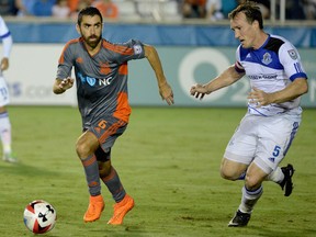 FC Edmonton captain Albert Watson, right, chases down Carolina RailHawks midfielder Austin Da Luz, in a North American Soccer League game Saturday, Sept. 24, 2016, at WakeMed Soccer Park in Cary, North Carolina. The RailHawks won the game 1-0.