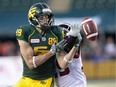 Calgary Stampeders Jamar Wall (29) blocks the catch on Edmonton Eskimos Chris Getzlaf (89) during second half CFL action in Edmonton, Alta., on Saturday September 10, 2016.