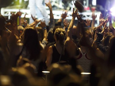 Fans cheer as Dallas Smith performs at Rogers Place in Edmonton, Alberta on Friday, September 16, 2016.