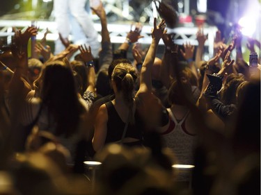 Fans cheer as Dallas Smith performs at Rogers Place in Edmonton, Alberta on Friday, September 16, 2016.