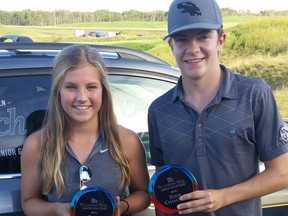 Cassidy Laidlaw (Bearspaw) and Reid Woodman (Blackhawk) show off their hardware after winning the titles at the 2016 McLennan Ross Junior Golf Tour Championship at Wolf Creek Resort. (Courtesy of McLennan Ross Junior Golf Tour) ORG XMIT: POS1609051914294986