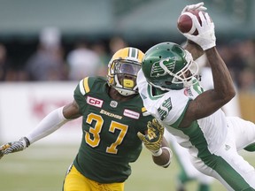 Kenny Ladler, shown here in action against the Roughriders in July, earned his first pick-six in the CFL against the Stampeders in Calgary on Monday.