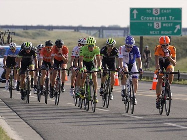 Riders head into the coulees during the first stage race of the Tour of Alberta cycling race in, Lethbridge, Alta., Thursday, Sept 1, 2016. Cyclists ride nine laps to complete the 107-kilometre circuit. The race attracts 120 cyclists from around the world.