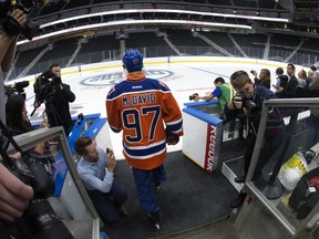 Connor McDavid is the first Edmonton Oilers to step out on to the ice at Rogers Place, in Edmonton on Thursday Sept. 1, 2016. Members of the Edmonton Oilers and players from the Edmonton Minor Hockey Association took to the ice for the first time Sept. 1.