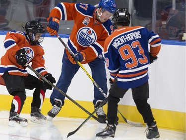 The Edmonton Oilers' Connor McDavid and players from the Edmonton Minor Hockey Association take the first skate on the ice at Rogers Place, in Edmonton on Thursday Sept. 1, 2016. Photo by David Bloom