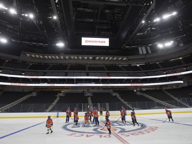 Members of the Edmonton Oilers and players from the Edmonton Minor Hockey Association take the first skate on the ice at Rogers Place, in Edmonton on Thursday Sept. 1, 2016. Photo by David Bloom