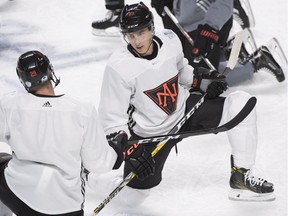 Team North America's Ryan Nugent-Hopkins, right, chats with Nathan MacKinnon during the team's World Cup hockey practice, Tuesday, September 6, 2016 in Montreal.THE CANADIAN PRESS/Ryan Remiorz ORG XMIT: RYR106