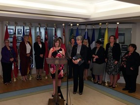 Stephanie McLean, Alberta minister of status of women, and Patty Hajdu, federal minister of status of women, speak to reporters after the annual meeting for status of women ministers from across Canada on Sept. 15, 2016.