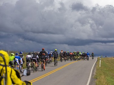 The cyclists in the Tour Of Alberta peloton ride through the Stoney First Nations Reserve near Morley, Alberta, on Friday, September 2, 2016.