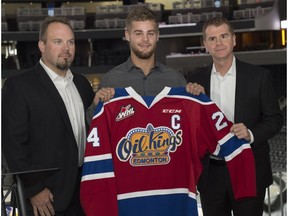 The Edmonton Oil Kings announced  on September 22, 2016 their team captain for the 2017 season will be Aaron Irving. From left is coach Steve Hamilton, Aaron Irving and General Manager Randy Hansch.