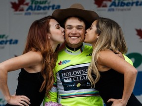 Tour of Alberta overall winner Robin Carpenter celebrates his victory during Stage 5 of the Tour of Alberta in Edmonton, Alta., on Monday, Sept. 5, 2016. (Codie McLachlan/Postmedia)