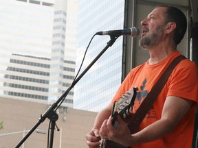 John Guliak performing on Churchill Square.