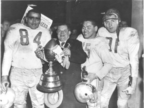 Eskimo Grey Cup Champions, 1956: from left, Johnny Bright, Moe Lieberman, Norman Kwong, Jackie Parker