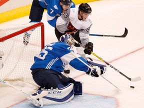 TORONTO, ON - SEPTEMBER 18: Ryan Nugent-Hopkins #93 of Team North America tries to get a shot off on Pekka Rinne #35 of Team Finland in the first period during the World Cup of Hockey at the Air Canada Center on September 18, 2016 in Toronto, Canada.