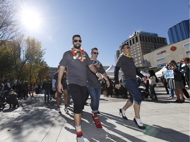 Men participate in YWCA Edmonton's Walk A Mile In Her Shoes in Edmonton, Alberta on Wednesday, September 21, 2016. Over $200,000 was raised for YWCA violence prevention and recovery programs. Ian Kucerak / Postmedia