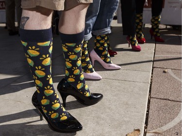 The Sherlock Holmes Hospitality Group team's shoes are seen during YWCA Edmonton's Walk A Mile In Her Shoes  in Edmonton, Alberta on Wednesday, September 21, 2016. Over $200,000 was raised for YWCA violence prevention and recovery programs.