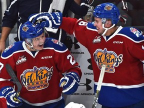 Edmonton Oil Kings Trey Fix-Wolansky, left, gets congratulated by teammate Kobe Mohr for scoring the first goal in the new arena against the Red Deer Rebels in WHL action at Rogers Place, the first-ever hockey game in the new arena in Edmonton Saturday, September 24, 2016.