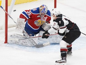 Edmonton Oil Kings goaltender Liam Hughes shuts the door on Vancouver Giants forward Ty Ronning during a WHL game at Rogers Place in Edmonton, Alta., on Tuesday, Oct. 11, 2016.