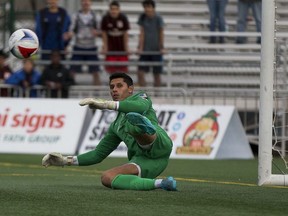 Jacksonville Armada FC Miguel Gallardo is scored on during a penalty kick by FC Edmonton's 
Daryl Fordyce (not pictured) at Clarke Field on Sunday, October 23, 2016 in Edmonton.