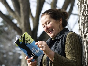 Author Katherine Koller poses for a photo with her new book Art Lessons.