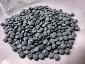 Fentanyl pills are shown in an undated police handout photo. Police and Alberta health officials are raising the alarm about a dangerous drug called W-18 that is much more toxic than fentanyl, another opioid that has been linked to hundreds of deaths in Canada.