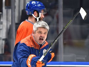 Todd McLellan clears his throat at a recent Oilers' practice