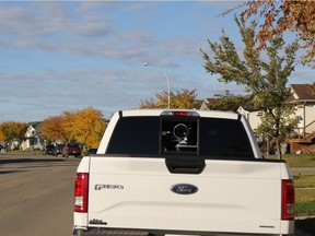 A photo radar camera in a white truck, operated by Global Traffic Group, the contractor that was getting about $8,000 to $9,000 per hour from a site eastbound on Highway 16 outside of Hinton, operates in a Grande Prairie school zone.