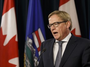Alberta Education Minister David Eggen speaks about his department's closure of Trinity Christian School Association during a press conference at the Alberta Legislature in Edmonton, Alberta on Tuesday, Oct. 25.