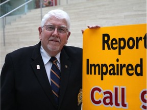 Barney Stevens, a retired Edmonton police officer and co-ordinator of Curb the Danger program since 2006, marks its 10th anniversary at Edmonton City Hall on Thursday, Oct. 27, 2016. The program has received over 8,000 tips of erratic or possible impaired drivers leading to 28,000 police interceptions and nearly 7,900 impaired driving arrests and 2,700 roadside suspensions.