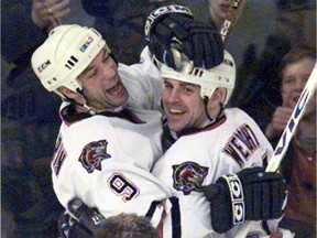 Bill Guerin, left, and Doug Weight celebrate a goal vs. the Ottawa Senators on Feb. 25, 1998.