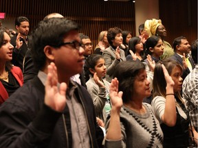 Canada's newest citizens took the oath at a swearing in ceremony at the Stanley Milner Library in Edmonton on Oct. 4, 2016, just before the launch of the 2016 Vital Signs report.