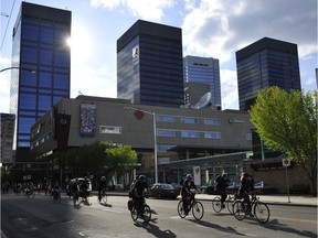 Edmonton council's vote to install 7.1 kilometres of separated bike lanes downtown will make it safe and more accessible for cyclists of all ages, writes Conrad Nobert. In this 2010 photo, cyclists launched Bike Month in downtown Edmonton.