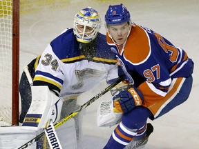 Edmonton Oilers centre Connor McDavid skates past St. Louis Blues goalie Jake Allen during first period NHL hockey game action in Edmonton on March 16, 2016.