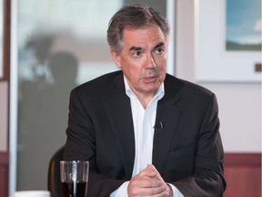 PC Leader and Alberta Premier Jim Prentice speaks to the Edmonton Journal editorial board during the 2015 Alberta Provincial Election in Edmonton on April 30, 2015.
