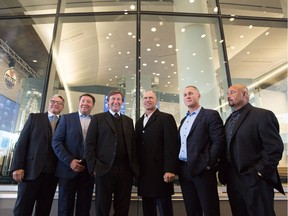 Edmonton Oilers alumni, from left, Glenn Anderson, Jurri Kurri, Wayne Gretzky, Mark Messier, Paul Coffey and Grant Fuhr attend the unveiling of the Wayne Gretzky statue and Hall of Fame room in Edmonton on Wednesday October 12, 2016.