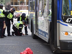 Edmonton police investigate Tuesday after an 83-year-old female pedestrian was struck and killed Oct. 4, 2016, by a city bus near West Edmonton Mall.