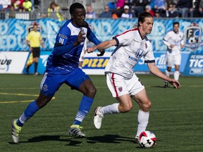 FC Edmonton's Pape Diakite (4) battles the Indy Eleven's Justin Braun (20) during NASL action at Clarke Stadium, in Edmonton on Sunday Oct. 2, 2016. Photo by David Bloom Photos off FC Edmonton game for story running in print Monday, Oct. 3.