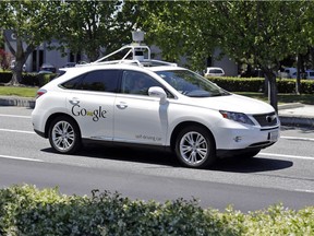 This May 13, 2014 file photo shows a Google self-driving Lexus at a Google event outside the Computer History Museum in Mountain View, Calif.