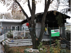 Fire ripped through a southeast Edmonton mobile home at 194 Lee Ridge Rd. on Thursday, Oct. 13, 2016. Homeowners Sherry Robinson and Lawrence Renz said while firefighters rescued one of their dogs, their pet miniature Pinscher and six cats died in the blaze.