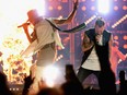 Brian Kelly and Tyler Hubbard of Florida Georgia Line perform at Bridgestone Arena on Oct. 13, 2016 in Nashville, Tennessee.