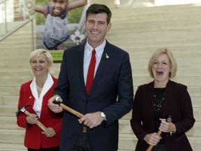 From left" Fort Saskatchewan Mayor Gale Katchur,  Edmonton Mayor Don Iveson and Premier Rachel Notley at Edmonton City Hall on Monday, Oct. 3, 2016, where funding for a Habitat For Humanity project was announced.