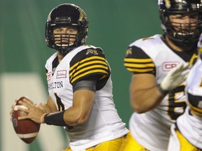 Hamilton Tiger Cats quarterback Zach Collaros looks for a receiver against the Saskatchewan Roughriders during CFL action in Regina on Saturday, September 24, 2016. Collaros will get the start on Friday against the Edmonton Eskimos after sitting out the past three weeks with a concussion.