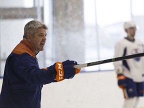Head coach Todd McLellan instructs his players during an Edmonton Oilers practice held at the Community Rink at Rogers Place in Edmonton, Alberta on Thursday, October 13, 2016.