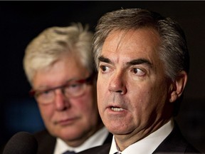 Alberta interim Premier Dave Hancock, left, and Premier-designate Jim Prentice speak to media before meeting to begin the transition of the Office of the Premier in Edmonton, on Monday Sept 8, 2014.