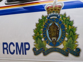 RCMP say a woman is dead after her Equinox plunged into a lake south of Fort McMurray on Tuesday, Nov. 8, 2016.