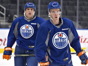 Edmonton Oilers' Milan Lucic (27) and Connor McDavid (97) skate together during training camp in Edmonton, Alta., on Tuesday September 27, 2016.The Edmonton Oilers have named teen superstar Connor McDavid their captain.