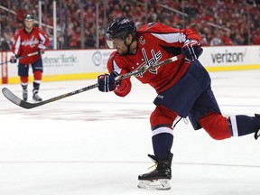 WASHINGTON, DC - OCTOBER 15: Alex Ovechkin #8 of the Washington Capitals shoots against New York Islanders during the second period at Verizon Center on October 15, 2016 in Washington, DC.