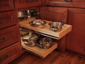 ShelfGenie uses sliding shelves to offer convenient storage solutions in existing cabinetry.